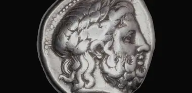 Ancient silver coin with the profile of a bearded man